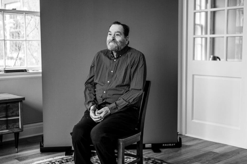 Big Talk participant during a contemplative profile portrait captured in a candid portrait session.