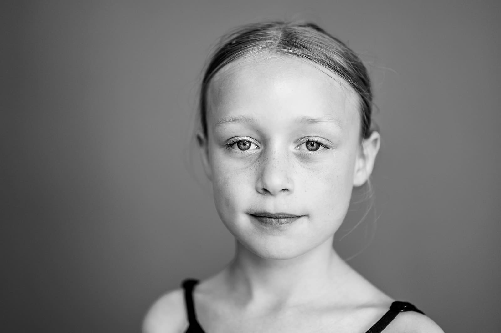 Fine art portrait of a child smiling during a five-minute Short & Sweet session
